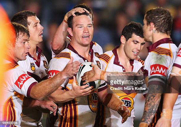 Dean Young of Country celebrates with bhis team mates after scoring a try during the ARL Origin match between Country and City at Regional Sports...
