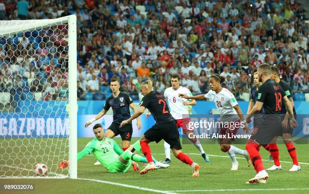 Mathias Jorgensen of Denmark scores his team's first goal past Danijel Subasic of Croatia during the 2018 FIFA World Cup Russia Round of 16 match...