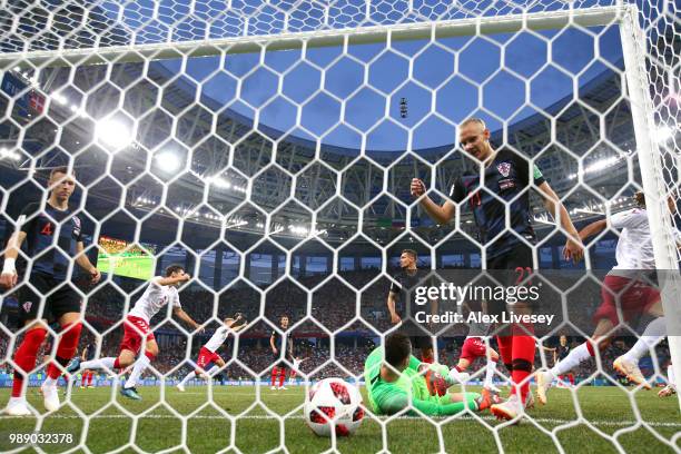 Denmark and Croatia players react following Denmark's first goal, scored by Mathias Jorgensen of Denmark during the 2018 FIFA World Cup Russia Round...