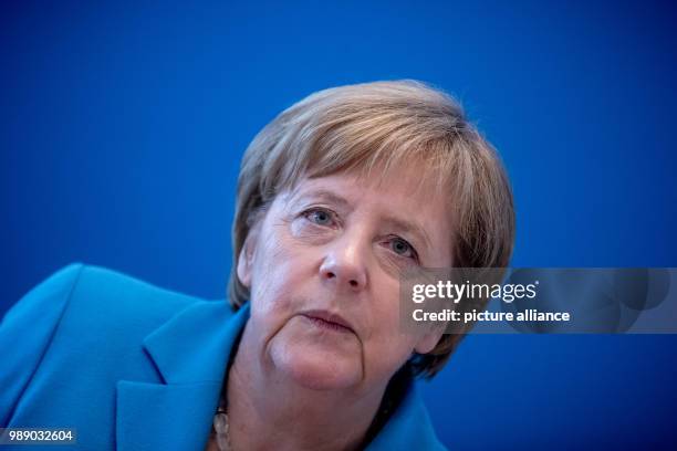 July 2018, Germany, Berlin: German Chancellor Angela Merkel waiting for the start of a meeting of the CDU executive at Konrad Adenauer Haus. Leading...