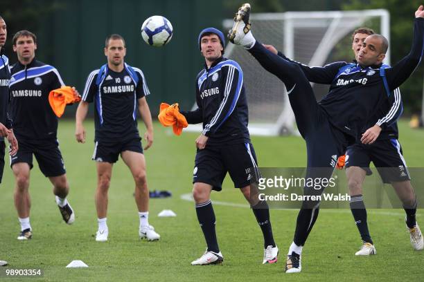 Alex and Yury Zhirkov of Chelsea during a training session at the Cobham Training Ground on May 7, 2010 in Cobham, England.