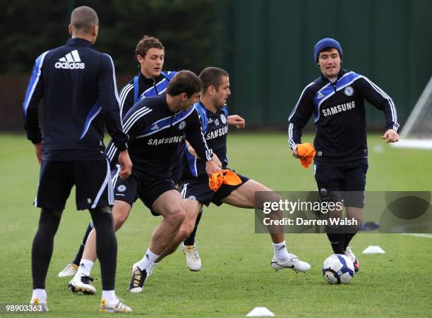 Joe Cole and Yury Zhirkov of Chelsea during a training session at the Cobham Training Ground on May 7, 2010 in Cobham, England.