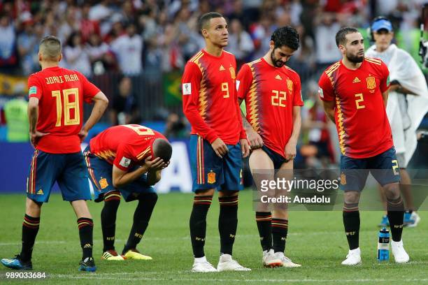 Players of Spain react after losing the penalty shoot-out during 2018 FIFA World Cup Russia Round of 16 match between Spain and Russia at the...