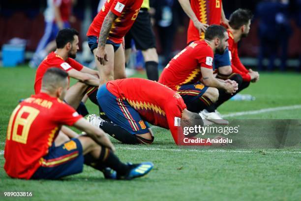 Players of Spain react after losing the penalty shoot-out during 2018 FIFA World Cup Russia Round of 16 match between Spain and Russia at the...