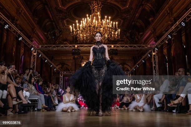 Model walks the runway during the Eva Minge Haute Couture Fall Winter 2018/2019 show as part of Paris Fashion Week on July 1, 2018 in Paris, France.