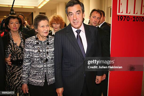 French Prime Minister Francois Fillon and Simone Veil leave les 'Etats Generaux de la Femme' at Sciences Po Paris on May 7, 2010 in Paris, France.