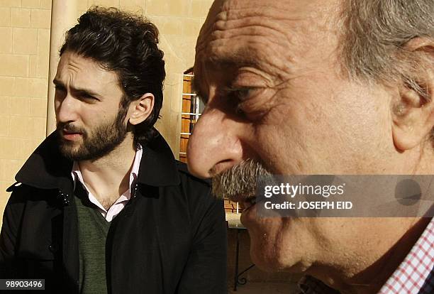 Lebanese Druze leader Walid Jumblatt walks with his eldest son Taymur at their ancestral home in Mukhtara in Lebanon's Shouf mountains, southeast of...