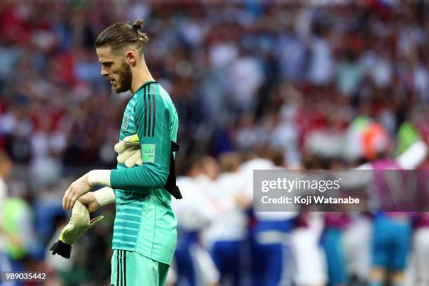 David De Gea of Spain and Gerard Pique of Spain look dejected following their sides defeat in the 2018 FIFA World Cup Russia Round of 16 match...