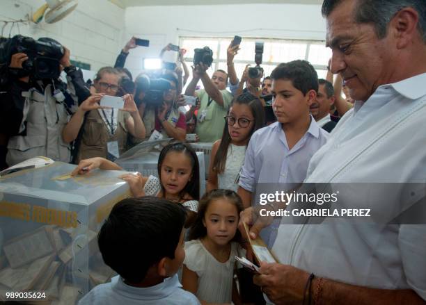 Mexico's presidential independent candidate Jaime "El Bronco" Rodriguez Calderon casts his vote during general elections, in Monterrey, Mexico on...