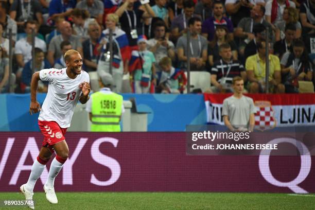 Denmark's defender Mathias Jorgensen celebrates after scoring during the Russia 2018 World Cup round of 16 football match between Croatia and Denmark...