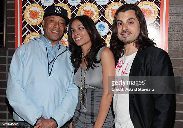 Russell Simmons, Rosario Dawson and Jamison Ernest arrive at Kastel for Rosario Dawson's Birthday Party at Trump Soho Hotel on May 6, 2010 in New...