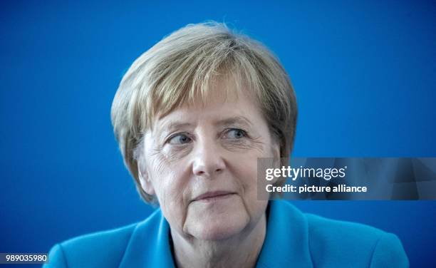 July 2018, Germany, Berlin: German Chancellor Angela Merkel waiting for the start of a meeting of the CDU executive at Konrad Adenauer Haus. Leading...