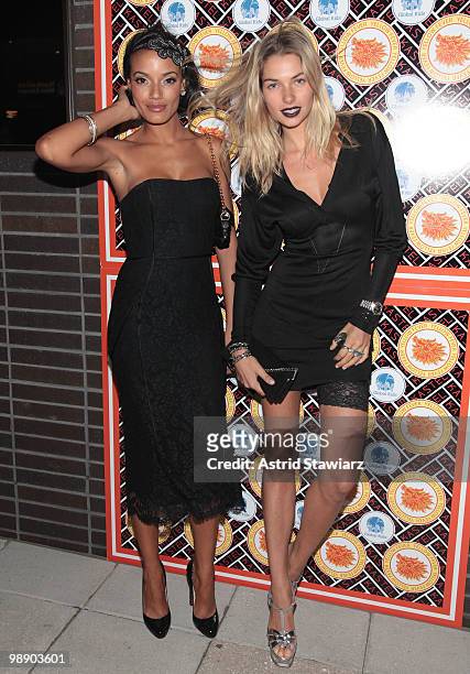 Models Selita Ebanks and Jessica Hart arrive at Kastel for Rosario Dawson's Birthday Party at Trump Soho Hotel on May 6, 2010 in New York City.