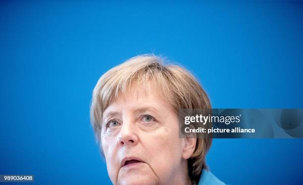 July 2018, Germany, Berlin: German Chancellor Angela Merkel waiting for the start of a meeting of the CDU executive at Konrad Adenauer Haus. Leading...