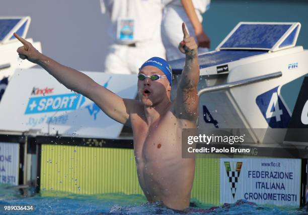 Andriy Govorov of Ukraine celebrates after setting a new world record in the men 50m butterfly during the 55th 'Sette Colli' international swimming...