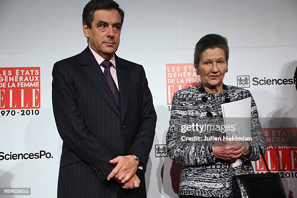 French Prime Minister Francois Fillon and former minister and European Parliament Chairwoman Simone Veil pose on the last day of the Women's Forum at...