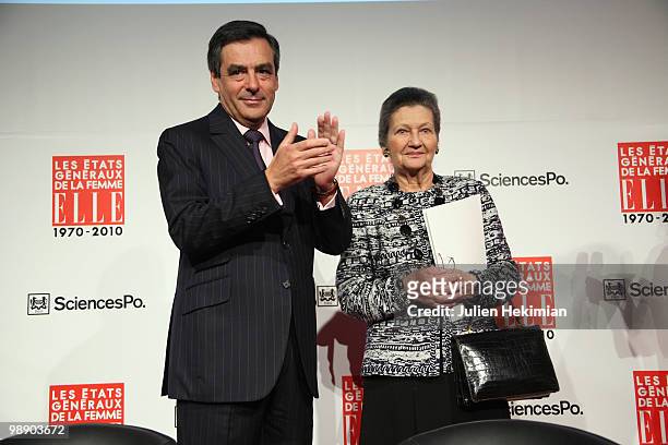 French Prime Minister Francois Fillon and former minister and European Parliament Chairwoman Simone Veil pose on the last day of the Women's Forum at...