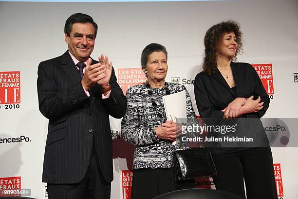 French Prime Minister Francois Fillon, former minister and European Parliament Chairwoman Simone Veil and editor in chief of ELLE magazine Valerie...