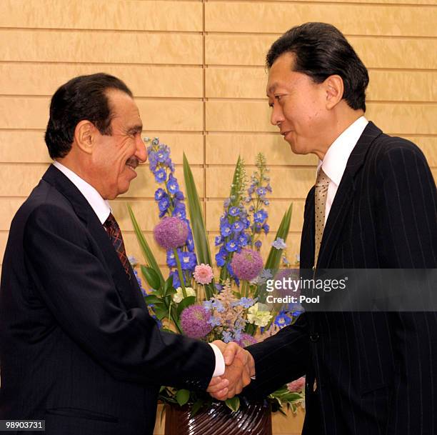 Japanese Prime Minister Yukio Hatoyama welcomes Saudi Economy and Planning Minister Khalid bin Muhammad al-Qusaybi at Hatoyama's official residence...