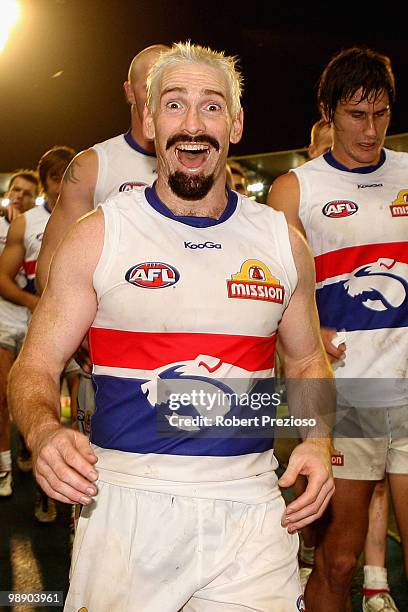 Jason Akermanis of the Bulldogs celebrates winning during the round seven AFL match between the Melbourne Demons and the Western Bulldogs at...