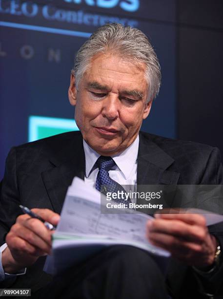 Peter Brabeck-Letmathe, chairman of Nestle SA, looks through his notes during the Committee Encouraging Corporate Philanthropy conference in London,...