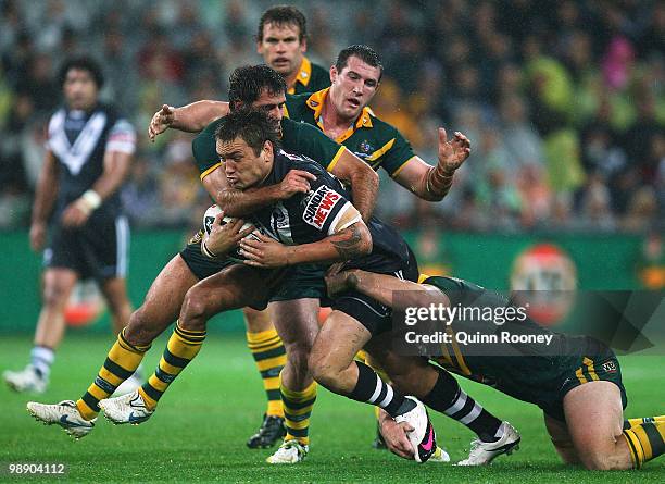 Jared Waerea-Hargreaves of the Kiwis is tackled by Cameron Smith of the kangaroos during the ARL Test match between the Australian Kangaroos and the...