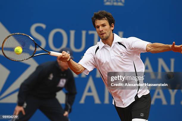 Philipp Petzschner of Germany plays a fore hand during his match against Tomas Berdych of Czech Republic on day 6 of the BMW Open at the Iphitos...