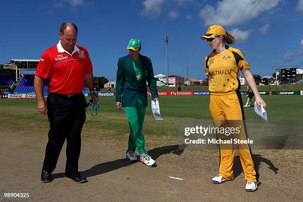 Alex Blackwell captain of Australia and Cri-Zelda Brits captain of South Africa alongside match referee Andy Pycroft of Zimbabwe during coin toss...