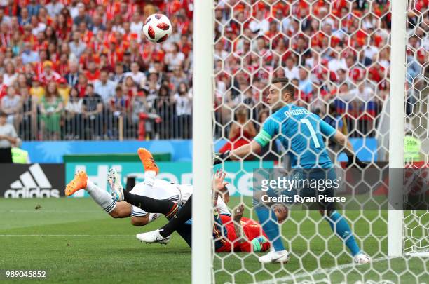 Sergey Ignashevich of Russia scores an own goal to put Spain in front 1-0 during the 2018 FIFA World Cup Russia Round of 16 match between Spain and...