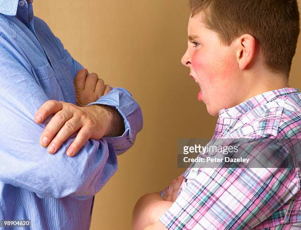 angry 12 year old boy shouting - stress resistant stockfoto's en -beelden