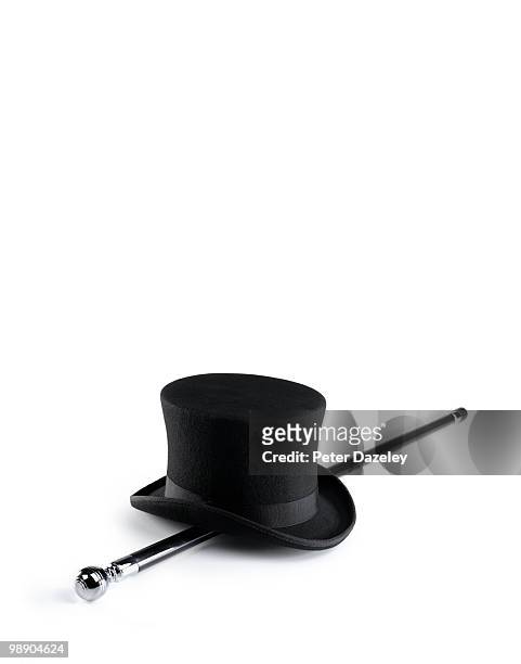 top hat and cane with copy space - hogehoed stockfoto's en -beelden