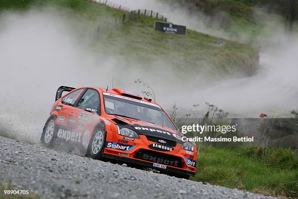 Henning Solberg of Norway and co-driver Ilka Minor of Austrian drive their Stobart Ford Focus during Leg1 of the WRC Rally of New Zealand on May 7,...