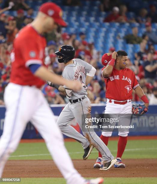 Nicholas Castellanos of the Detroit Tigers circles the bases after hitting a grand slam home run in the fifth inning during MLB game action as J.A....