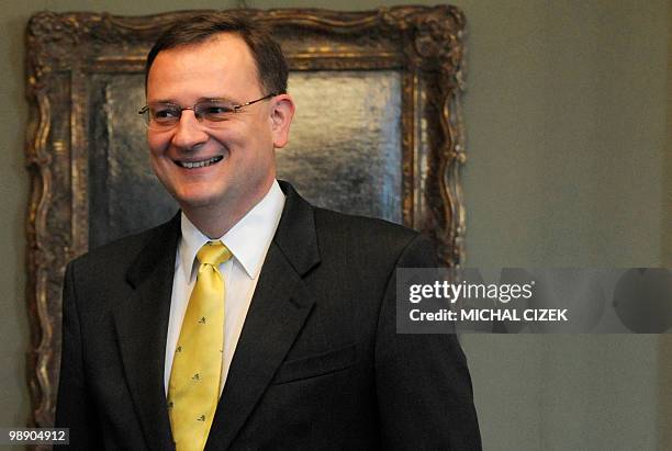 Chairman of the Czech Civic Democratic Party , Petr Necas, smiles as he arrives on the meeting with former Chairman of the Civic Democratic Party and...