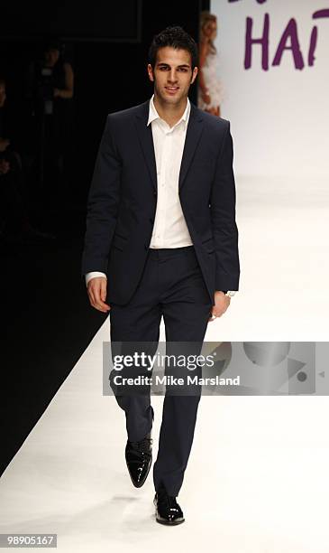 Francesc Fabregas walks the runway at the Fashion for Relief show for London Fashion Week Autumn/Winter 2010 at Somerset House on February 18, 2010...