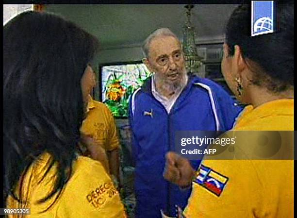 Grab from a video shot on August 22, 2009 and released by the Cuban TV on August 23, 2009 in Havana of Cuban leader Fidel Castro and Venezuelan Law...