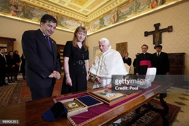 Pope Benedict XVI meets President of Georgia Mikheil Saakashvili and his wife at his library on May 7, 2010 in Vatican City, Vatican.