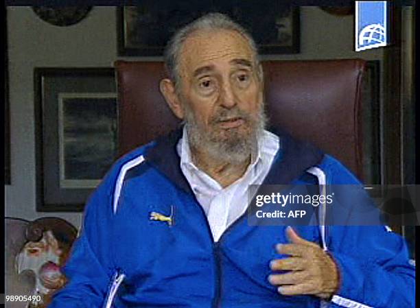 Grab from a video shot on August 22, 2009 and released by the Cuban TV on August 23, 2009 in Havana of Cuban leader Fidel Castro and Venezuelan Law...