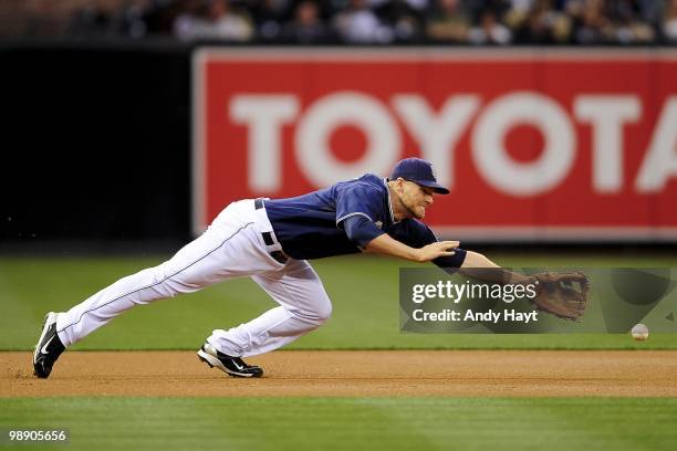 Chase Headley of the San Diego Padres dives for the ball against the Colorado Rockies at Petco Park on Wednesday, May 5, 2010 in San Diego,...