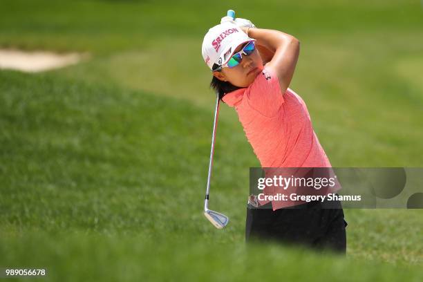 Nasa Hataoka of Japan hits from a fairway bunker on the 18th hole during the final round of the 2018 KPMG PGA Championship at Kemper Lakes Golf Club...