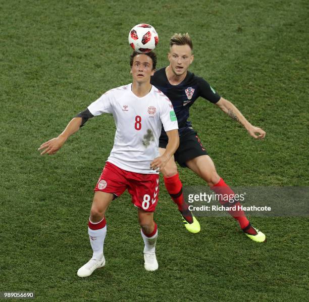 Thomas Delaney of Denmark battles for possession with Ivan Rakitic of Croatia during the 2018 FIFA World Cup Russia Round of 16 match between Croatia...