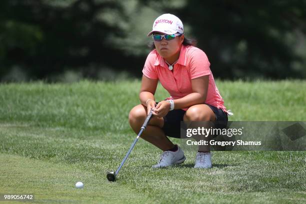 Nasa Hataoka of Japan reads a putt on the 18th green during the final round of the 2018 KPMG PGA Championship at Kemper Lakes Golf Club on July 1,...