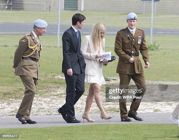 Prince Charles, Prince of Wales, Prince Harry and Chelsy Davy attend Prince Harry's Pilot Course Graduation at the Army Aviation Centre on May 7,...