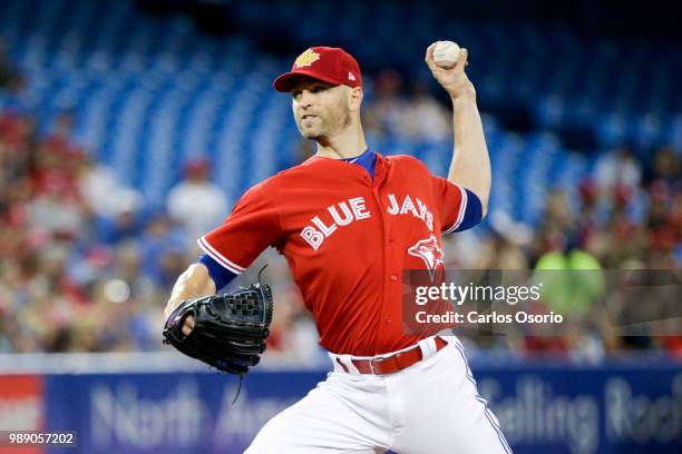 Happ of the Blue Jays delivers a pitch during the 2nd inning of MLB action as the Toronto Blue Jays host the Detroit Tigers at Rogers Centre on July...