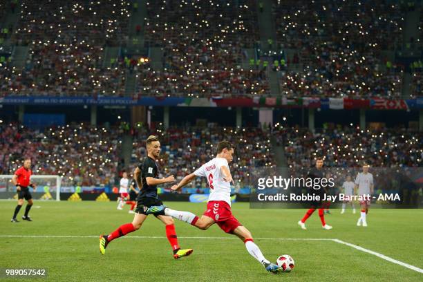 Andreas Christensen of Denmark competes with Ivan Rakitic of Croatia during the 2018 FIFA World Cup Russia Round of 16 match between Croatia and...