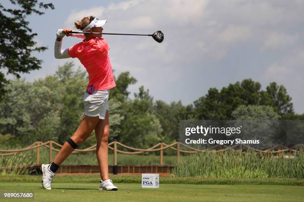 Nelly Korda hits her tee shot on the 18th hole during the final round of the 2018 KPMG PGA Championship at Kemper Lakes Golf Club on July 1, 2018 in...