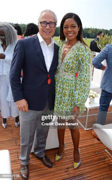 Jon Zammett, Audi UK Head of Public Relations, and Naomie Harris attend the Audi Polo Challenge at Coworth Park Polo Club on July 1, 2018 in Ascot,...