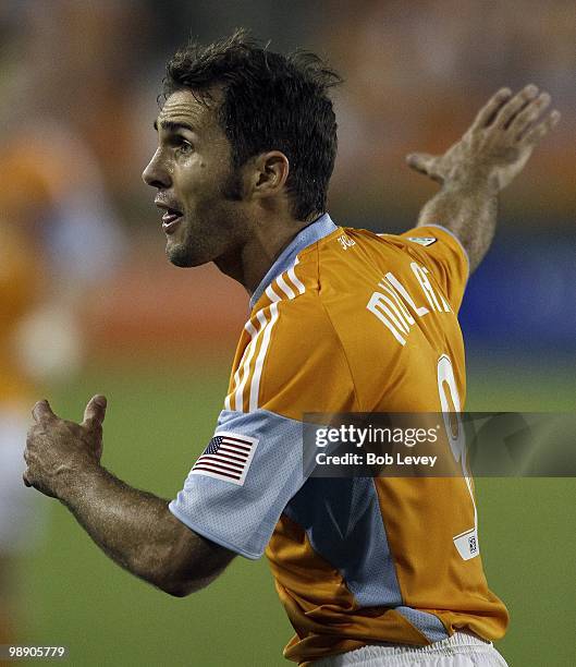 Brian Mullan of the Houston Dynamo reacts against FC Dallas at Robertson Stadium on May 5, 2010 in Houston, Texas.