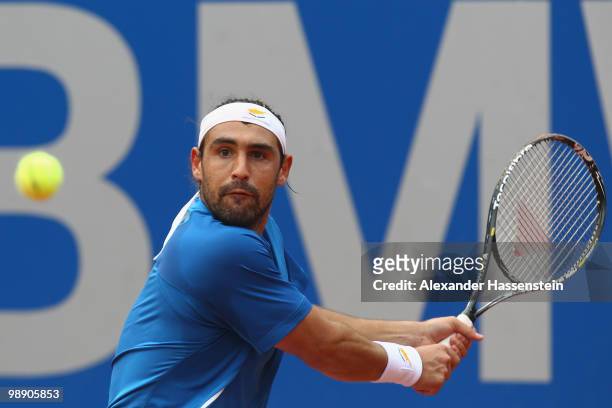 Marcos Baghdatis of Cyprius plays a back hand during his match against Philipp Kohlschreiber of Germany on day 6 of the BMW Open at the Iphitos...