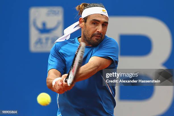 Marcos Baghdatis of Cyprius plays a back hand during his match against Philipp Kohlschreiber of Germany on day 6 of the BMW Open at the Iphitos...